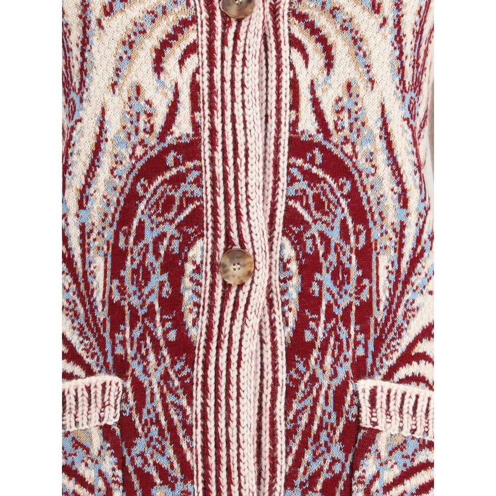 Multicolor Wool CardiganEtro’s maxi Cardigan expresses all the brand’s charm through a refined Paisley floral jacquard pattern. Crafted from a soft wool and cotton blend, it features an over fit, shawl lapels, two large patch pockets and ribbed trim for a