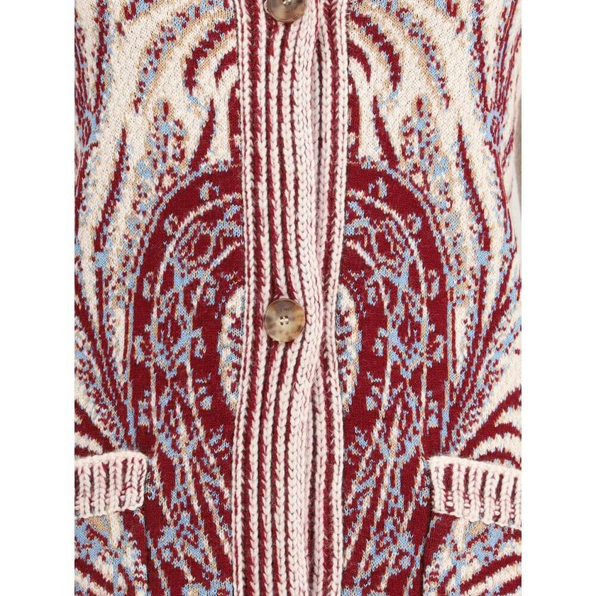 Multicolor Wool CardiganEtro’s maxi Cardigan expresses all the brand’s charm through a refined Paisley floral jacquard pattern. Crafted from a soft wool and cotton blend, it features an over fit, shawl lapels, two large patch pockets and ribbed trim for a
