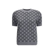 Gray Wool SweatshirtGucci’s short-sleeve Sweater is a retro-inspired piece that celebrates the house’s iconic aesthetic. Crafted in the unmistakable GG Supreme pattern, it features a ribbed crew neck and ribbed trim at the hem as well, defining the line w
