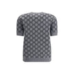Gray Wool SweatshirtGucci’s short-sleeve Sweater is a retro-inspired piece that celebrates the house’s iconic aesthetic. Crafted in the unmistakable GG Supreme pattern, it features a ribbed crew neck and ribbed trim at the hem as well, defining the line w