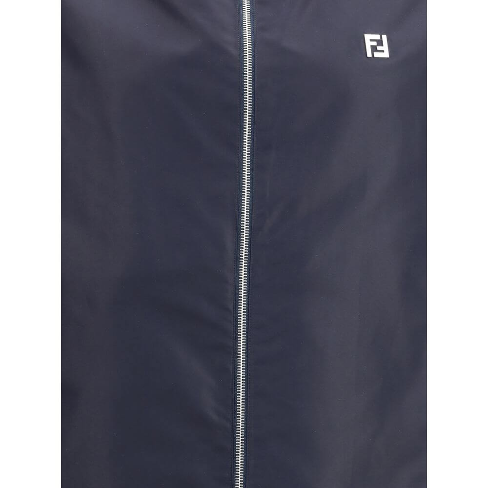 Multicolor Polyester Shell JacketFendi’s reversible K-Way Jacket is a practical and contemporary outerwear designed to combine functionality and style. Featuring a front zipper closure, it features a hooded design, two side welt pockets and adjustable dra