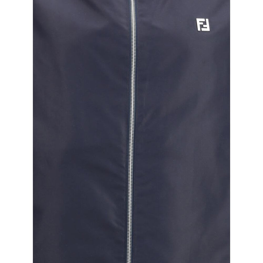 Multicolor Polyester Shell JacketFendi’s reversible K-Way Jacket is a practical and contemporary outerwear designed to combine functionality and style. Featuring a front zipper closure, it features a hooded design, two side welt pockets and adjustable dra