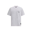 T-shirt with pocketCotton T-Shirt by Fendi features a crew neck and regular fit for optimal comfort. On the front, a zippered patch pocket is embellished with the brand’s iconic contrasting monogram, adding a distinctive detail. The monochrome pattern giv