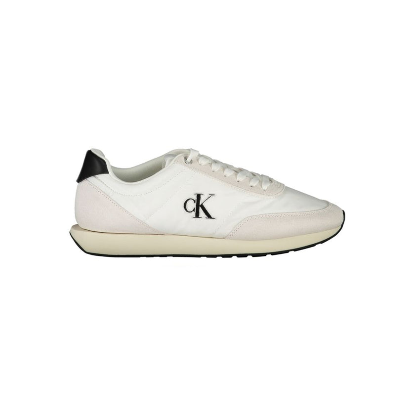 White Polyester Men SneakerDare to make a bold statement with the sleek Calvin Klein sneakers that redefine contemporary sportiness. Crafted with sophistication in mind, these kicks boast contrasting black accents and a notable logo embroidery that ensure