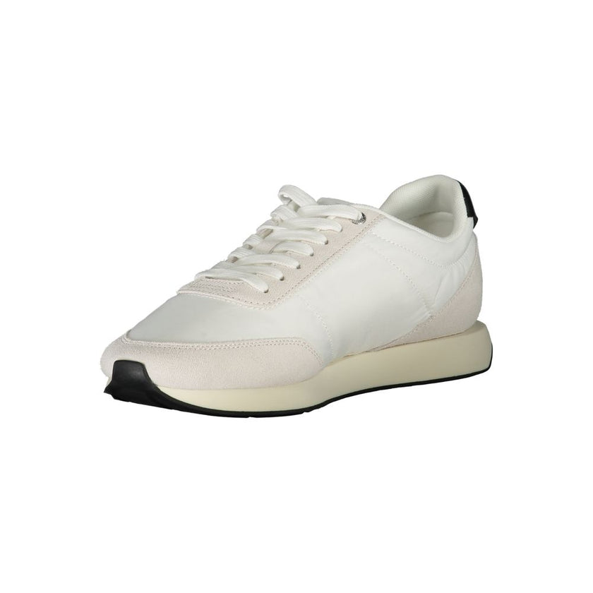White Polyester Men SneakerDare to make a bold statement with the sleek Calvin Klein sneakers that redefine contemporary sportiness. Crafted with sophistication in mind, these kicks boast contrasting black accents and a notable logo embroidery that ensure
