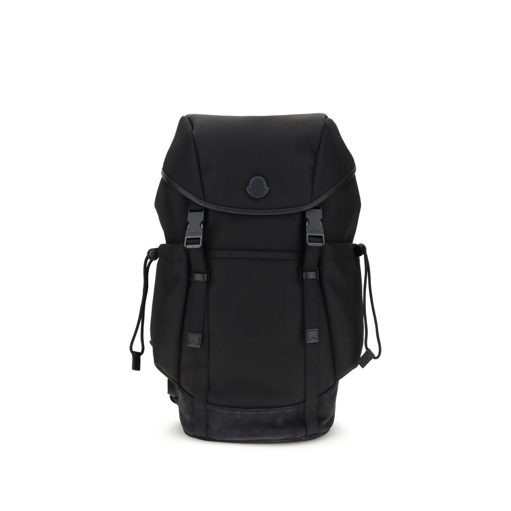 Tech BackpackMoncler’s tech Backpack combines functionality and style in a modern, practical design. Featuring a front flap closure and two snap buckles, it offers security and ease of use. The logo on the front lends a distinctive touch, while adjustable
