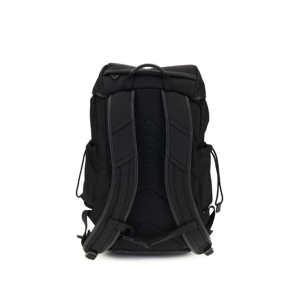 Tech BackpackMoncler’s tech Backpack combines functionality and style in a modern, practical design. Featuring a front flap closure and two snap buckles, it offers security and ease of use. The logo on the front lends a distinctive touch, while adjustable