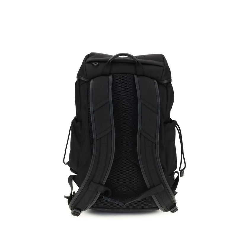Tech BackpackMoncler’s tech Backpack combines functionality and style in a modern, practical design. Featuring a front flap closure and two snap buckles, it offers security and ease of use. The logo on the front lends a distinctive touch, while adjustable