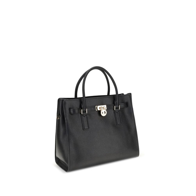 Black Calf Leather Bos Taurus Shoulder BagThe Michael Kors leather Shoulder Bag combines elegance and practicality, complete with a protective textile bag to keep it safe from dust. The design is enhanced by metal studs on the bottom, protecting the base