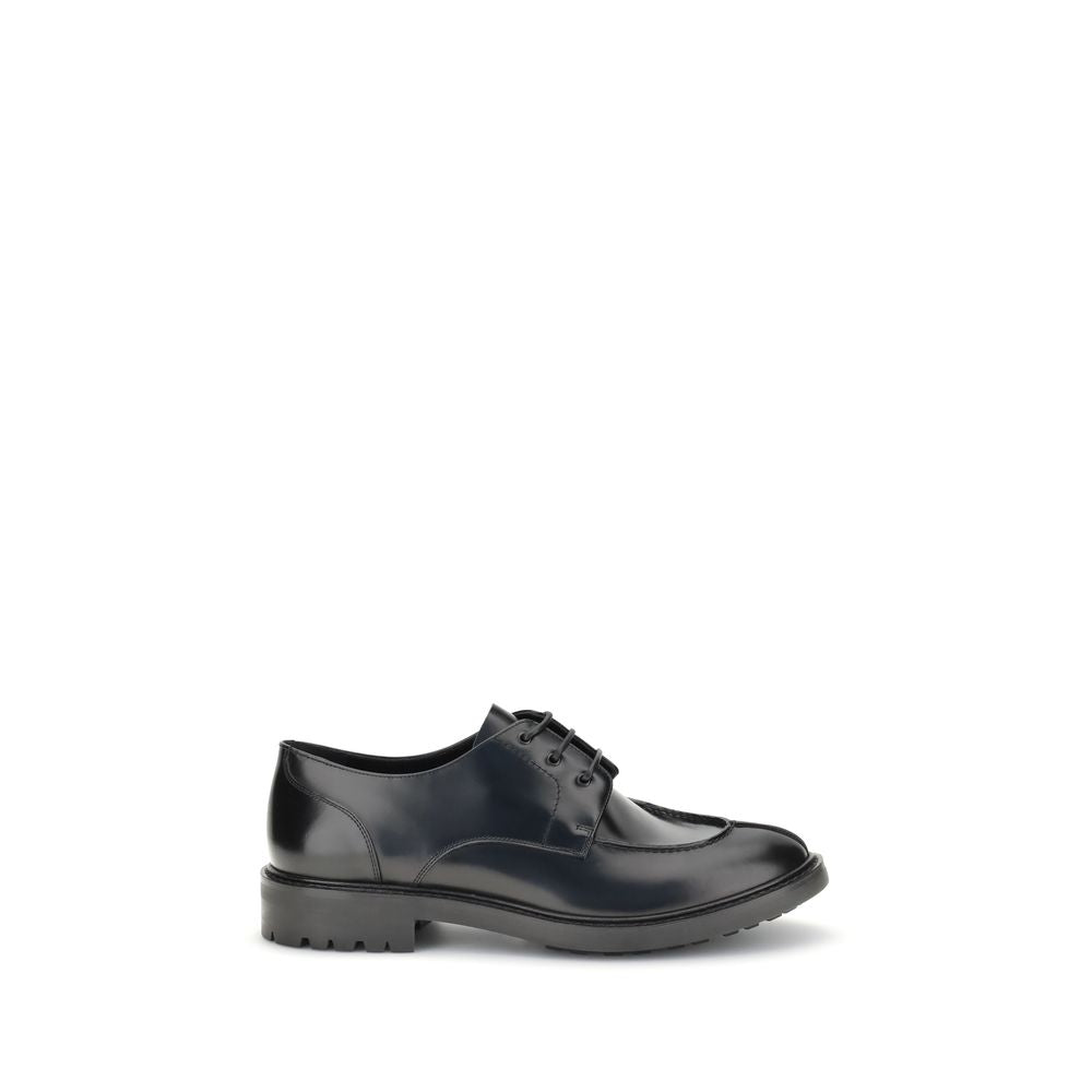 Black Calf Leather Bos Taurus Oxfords And DerbiesSaint Laurent’s leather Lace-Ups reinterpret the classic Derby model with a bold, contemporary twist. Made of smooth leather, they are distinguished by an almond toe and a squared tub construction that lend