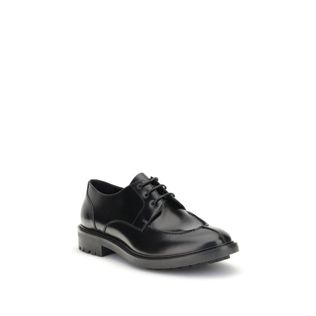 Black Calf Leather Bos Taurus Oxfords And DerbiesSaint Laurent’s leather Lace-Ups reinterpret the classic Derby model with a bold, contemporary twist. Made of smooth leather, they are distinguished by an almond toe and a squared tub construction that lend