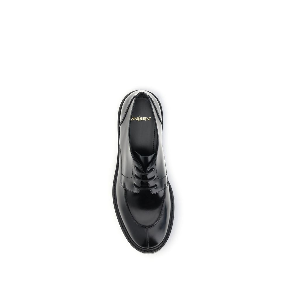 Black Calf Leather Bos Taurus Oxfords And DerbiesSaint Laurent’s leather Lace-Ups reinterpret the classic Derby model with a bold, contemporary twist. Made of smooth leather, they are distinguished by an almond toe and a squared tub construction that lend
