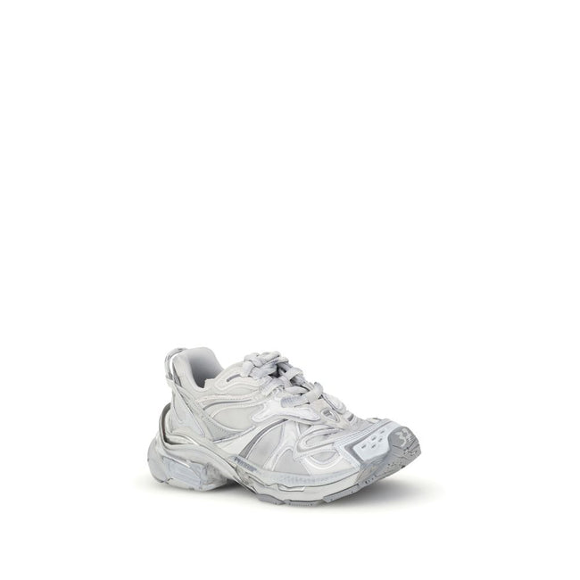 Silver Rubber Athletic SneakersBalenciaga’s Runner 2.0 Sneakers stand out for their worn-in effect, recalling a grunge and lived-in aesthetic typical of the brand. They feature the size printed on the toe and embossed on the back, along with the “Runner”