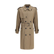 Beige Cotton Trench CoatBurberry’s long cotton gabardine Trench Coat combines tradition and modernity in an iconic garment. Raglan sleeves soften the shoulders, while buttoned welt pockets recall archival designs. Featuring a relaxed fit, it features a do