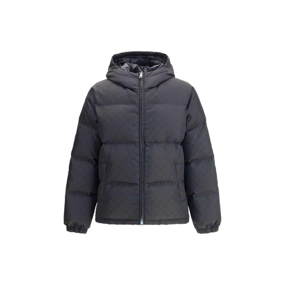 Black Polyamide CoatGucci’s GG patterned padded Down Jacket is an iconic and functional garment. Featuring a hood and double-slider zipper closure, it features the famous “GG” monogram as a distinctive element. Low shoulders and long sleeves with elastic