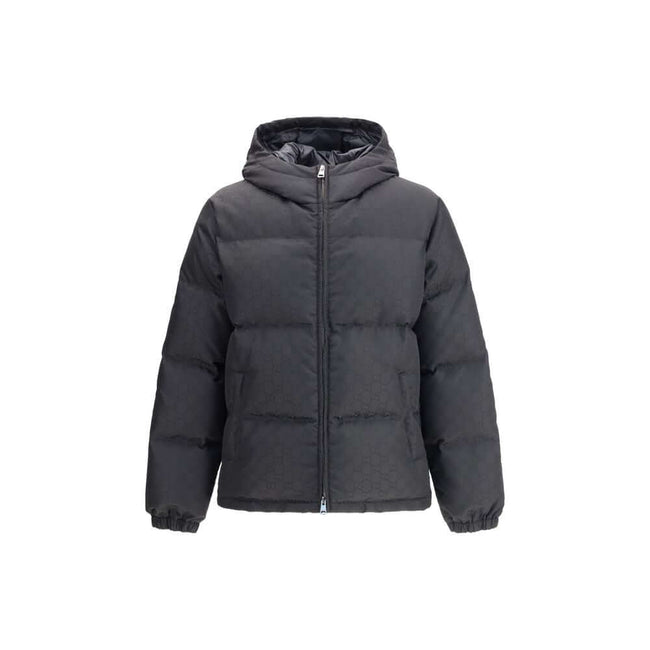 Black Polyamide CoatGucci’s GG patterned padded Down Jacket is an iconic and functional garment. Featuring a hood and double-slider zipper closure, it features the famous “GG” monogram as a distinctive element. Low shoulders and long sleeves with elastic