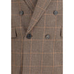 Beige Wool BlazerThe Prince de Galles wool Blazer by Saint Laurent is a garment with classic tailored appeal. It features a double-breasted silhouette with a six-button closure, enhanced by padded shoulders that add structure. At the front, two welt flap
