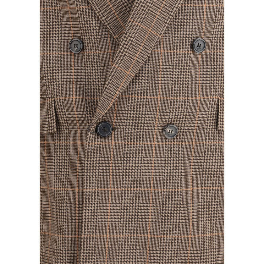 Beige Wool BlazerThe Prince de Galles wool Blazer by Saint Laurent is a garment with classic tailored appeal. It features a double-breasted silhouette with a six-button closure, enhanced by padded shoulders that add structure. At the front, two welt flap