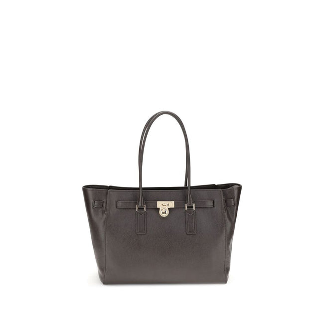 Brown Calf Leather Bos Taurus Shoulder BagThe Hamilton Moderne large Tote Bag by Michael Kors is a roomy, structured model designed to combine functionality and elegance. The silhouette with decorative belt and iconic padlock pendant define its sophistica