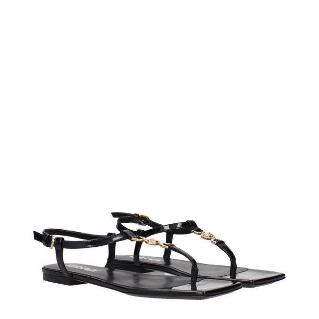 Black Leather Flip-Flop SandalsDescription: The product with MPN 1013453D2VE1B00V and code F84199 patent leather in black is a flip flops designed by Versace. Additional Info: Color details: Gold Style: Casual Closing type: Buckle Closure Materials: Paten