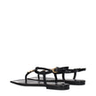 Black Leather Flip-Flop SandalsDescription: The product with MPN 1013453D2VE1B00V and code F84199 patent leather in black is a flip flops designed by Versace. Additional Info: Color details: Gold Style: Casual Closing type: Buckle Closure Materials: Paten