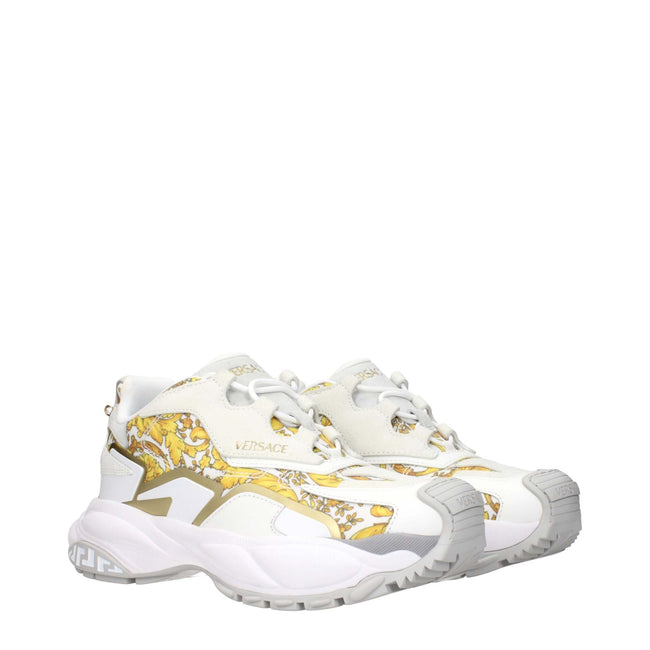 Gold Fabric Low Top SneakersDescription: The product with MPN 10163181A146866WG4V and code F84197 fabric in gold is a sneakers designed by Versace. It has features like front logo, side logo, back logo, print which can vary.Gold Fabric Low Top Sneakers${t