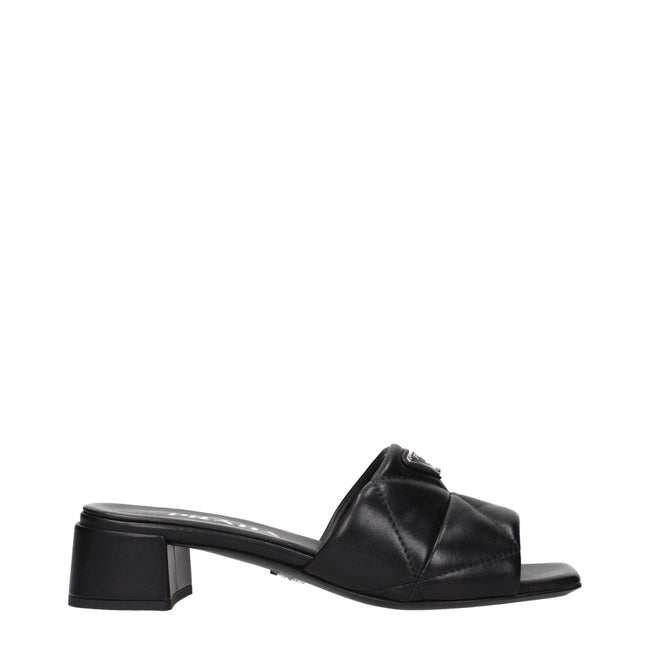 Black Leather Flat SandalsDescription: The product with MPN 1XX656038035F0002 and code F84279 leather in black is a sandals designed by Prada. It has features like front logo.Black Leather Flat Sandals${tagsPradaAulae Black Leather Sandals PradaAulae Blac