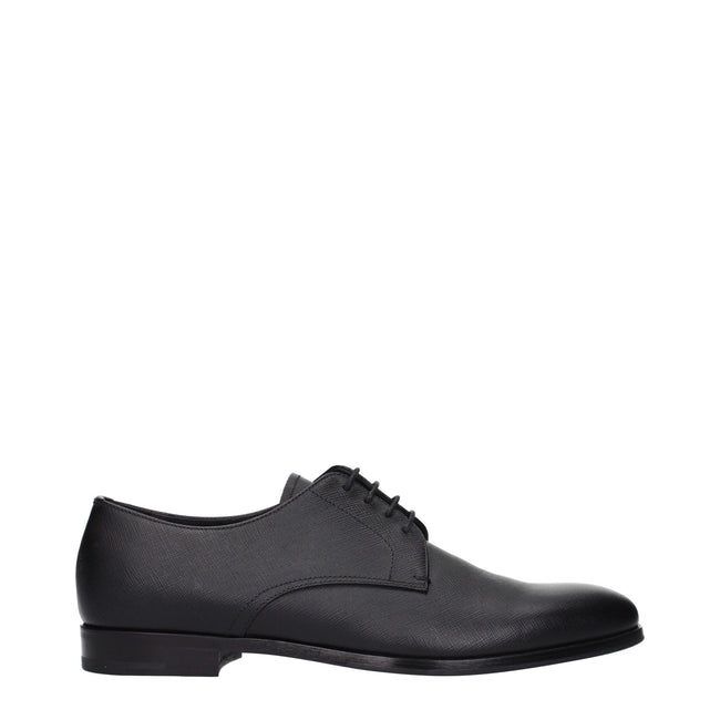 Black Leather Oxfords And DerbiesDescription: The product with MPN 2EB172053F0002 and code F84298 leather in black is a lace up and monkstrap designed by Prada. Additional Info: Style: Casual Closing type: Lace up Closure Shoe sole: Rubber Shoe tip: Round