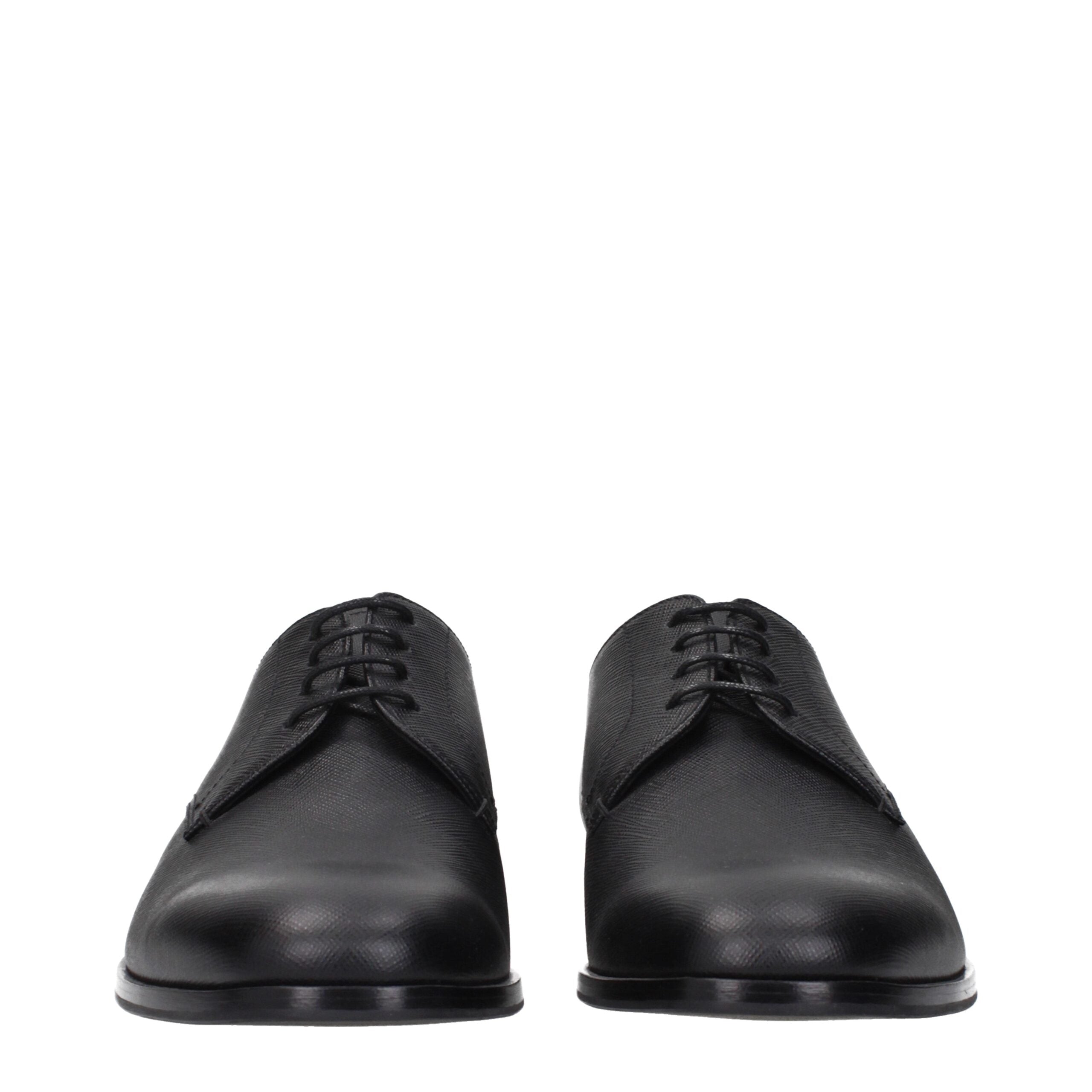 Black Leather Oxfords And DerbiesDescription: The product with MPN 2EB172053F0002 and code F84298 leather in black is a lace up and monkstrap designed by Prada. Additional Info: Style: Casual Closing type: Lace up Closure Shoe sole: Rubber Shoe tip: Round
