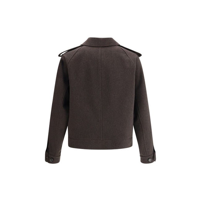 Brown Cashmere CoatBurberry’s cashmere Jacket is an elegant and refined piece, featuring a classic collar and a concealed front button closure that enhances the clean design. The short style features two welt pockets on the front, perfect for a sophistica