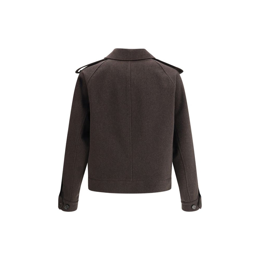 Brown Cashmere CoatBurberry’s cashmere Jacket is an elegant and refined piece, featuring a classic collar and a concealed front button closure that enhances the clean design. The short style features two welt pockets on the front, perfect for a sophistica