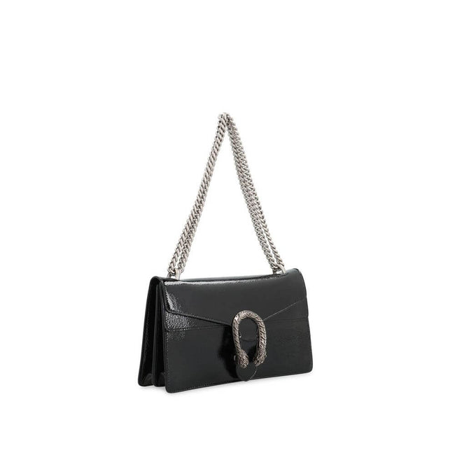 Black Calfskin Crossbody BagDescription: – Composition: 100% calf leather – Lining: Leather – Patent effect – Suede effect microfiber lining – Sliding chain strap – Antique silver-tone metal hardware – Flap with push-lock closure – Flap pocket under the f