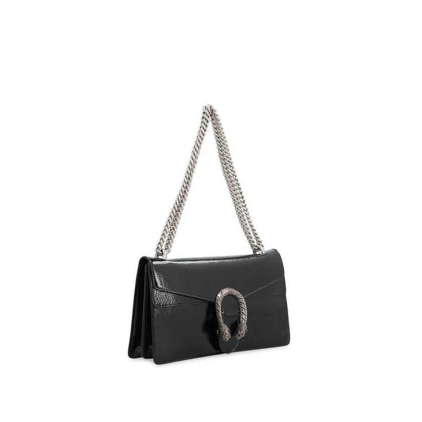 Black Calfskin Crossbody BagDescription: – Composition: 100% calf leather – Lining: Leather – Patent effect – Suede effect microfiber lining – Sliding chain strap – Antique silver-tone metal hardware – Flap with push-lock closure – Flap pocket under the f