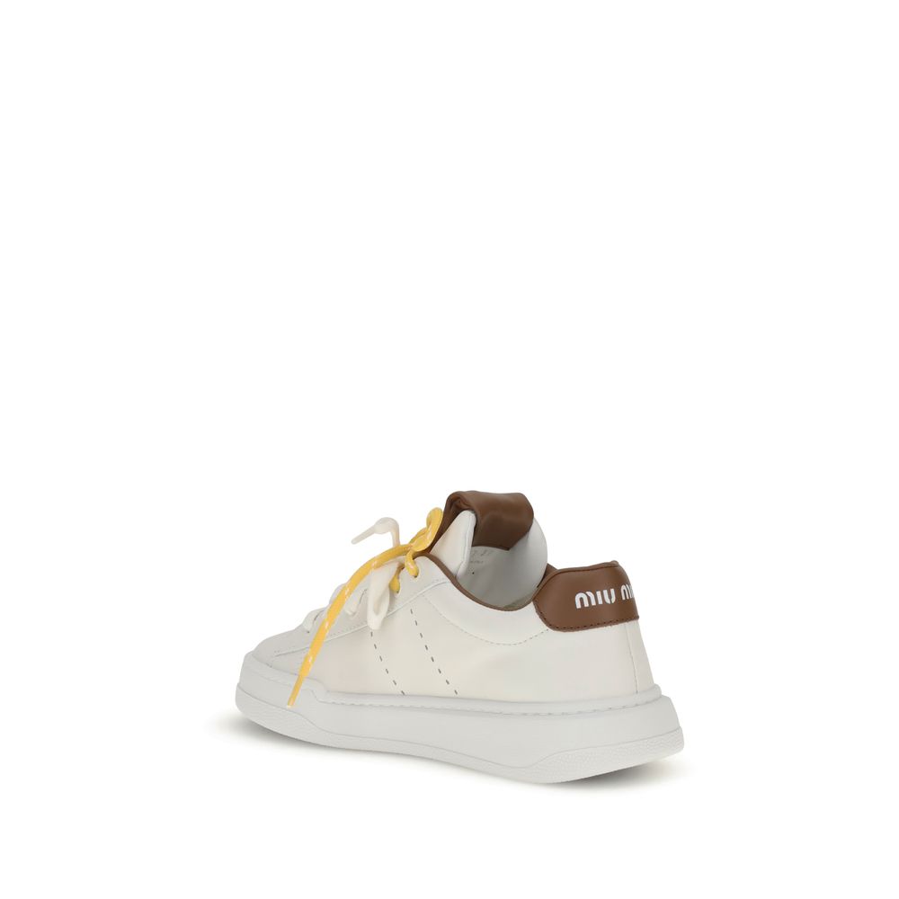 White Rubber Low Top SneakersThe Miu Miu leather Sneakers you describe are a sophisticated and distinctive design. The two-tone double lace-up closure on the front lends a touch of originality, while the round toe ensures comfort and style. The iconic mon