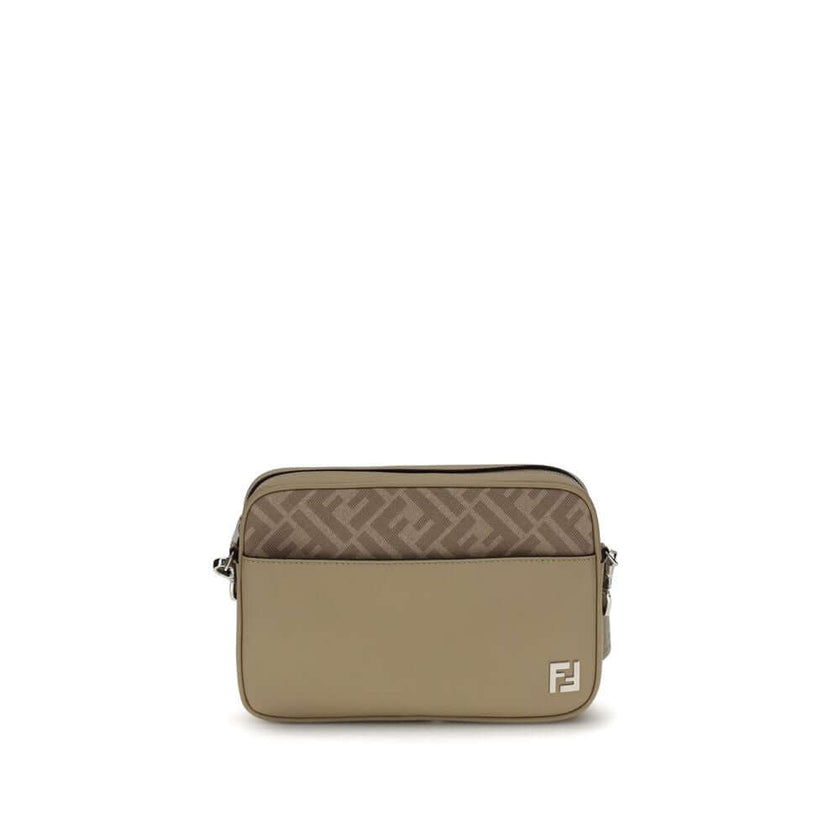 Beige Leather Shoulder BagFendi’s Camera Case Squared FF Shoulder Bag is a compact and refined model made of smooth beige leather combined with iconic FF canvas in the same tone. Embellished with a metal FF appliqué, it features an exterior flat pocket an