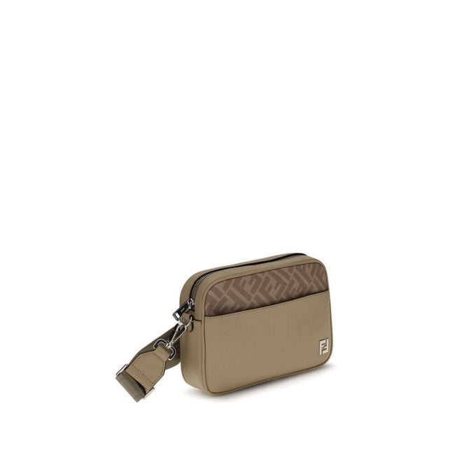 Beige Leather Shoulder BagFendi’s Camera Case Squared FF Shoulder Bag is a compact and refined model made of smooth beige leather combined with iconic FF canvas in the same tone. Embellished with a metal FF appliqué, it features an exterior flat pocket an