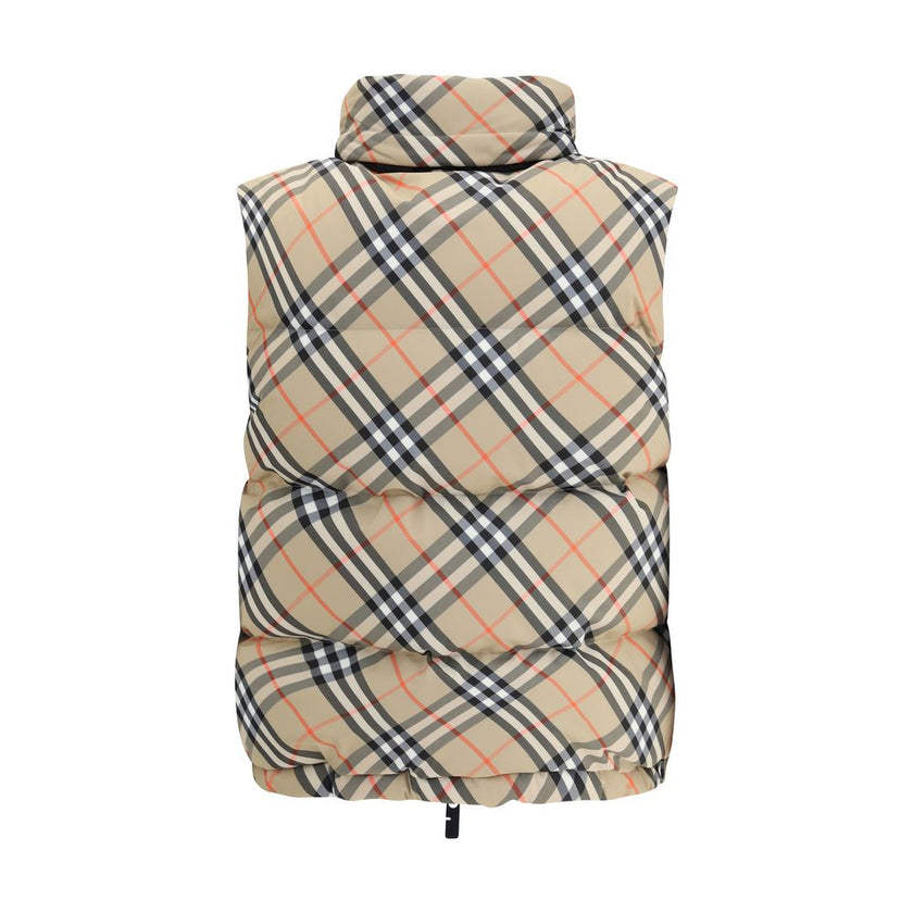 Multicolor Polyester Sleveless JacketBurberry’s Check vest Down Jacket is an iconic garment made of water-repellent Burberry Check fabric with a regular fit and down and goose down filling. Featuring a double-slider zipper closure, it features a packaway