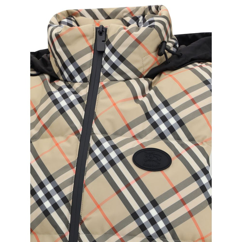 Multicolor Polyester Sleveless JacketBurberry’s Check vest Down Jacket is an iconic garment made of water-repellent Burberry Check fabric with a regular fit and down and goose down filling. Featuring a double-slider zipper closure, it features a packaway