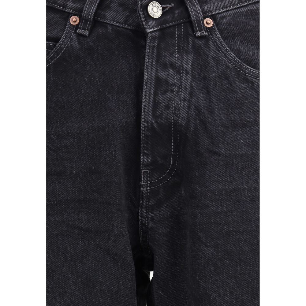 Black Cotton Slim Fit JeansSaint Laurent’s V-waist Jeans stand out for their original tailored cut. Made in the classic five-pocket style, they feature a button and flap closure with buttons. The V waist, enriched with belt loops, gives a modern, slim sil
