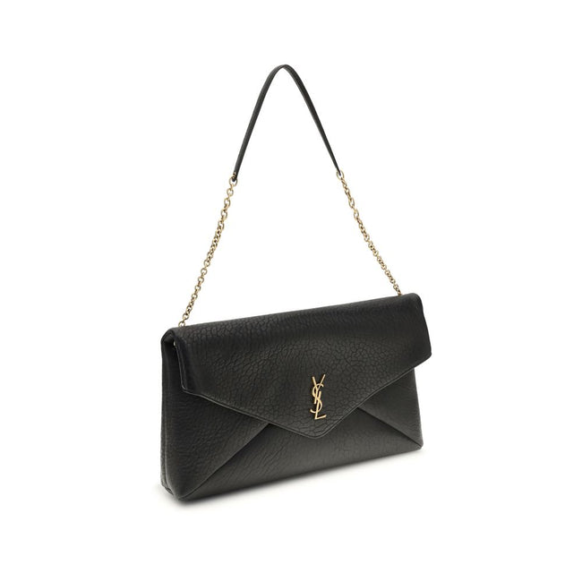 Black Lamb Ovis Aries Aries Shoulder BagThe Cassandre XXL Shoulder Bag with Chain by Saint Laurent is an extra-large clutch made of soft lambskin leather, embellished with the iconic metal Cassandre logo. Equipped with a stowable cable chain strap, it can