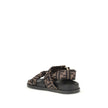 FF satin SandalsFendi’s FF satin Sandals combine bold style and iconic details. The design features padded straps and a decorative D-ring buckle with three-dimensional Fendi lettering, lending character and recognition to the model. Made of satin with the