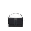 Black Nylon Shoulder BagThe Bambino Shoulder Bag by Jacquemus reinterprets the messenger style with a practical, contemporary design. Made of padded nylon, it features a leather handle and magnetic flap with tab, combined with a zipper closure for added s