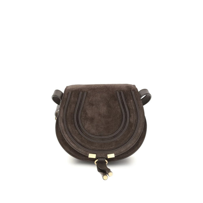 Brown Calf Leather Bos Taurus Shoulder BagChloé’s Marcie small Shoulder Bag stands out for its curved silhouette and defined top profile. The flap, embellished with leather tassels, is embellished with the iconic saddle stitching that characterizes the Ma