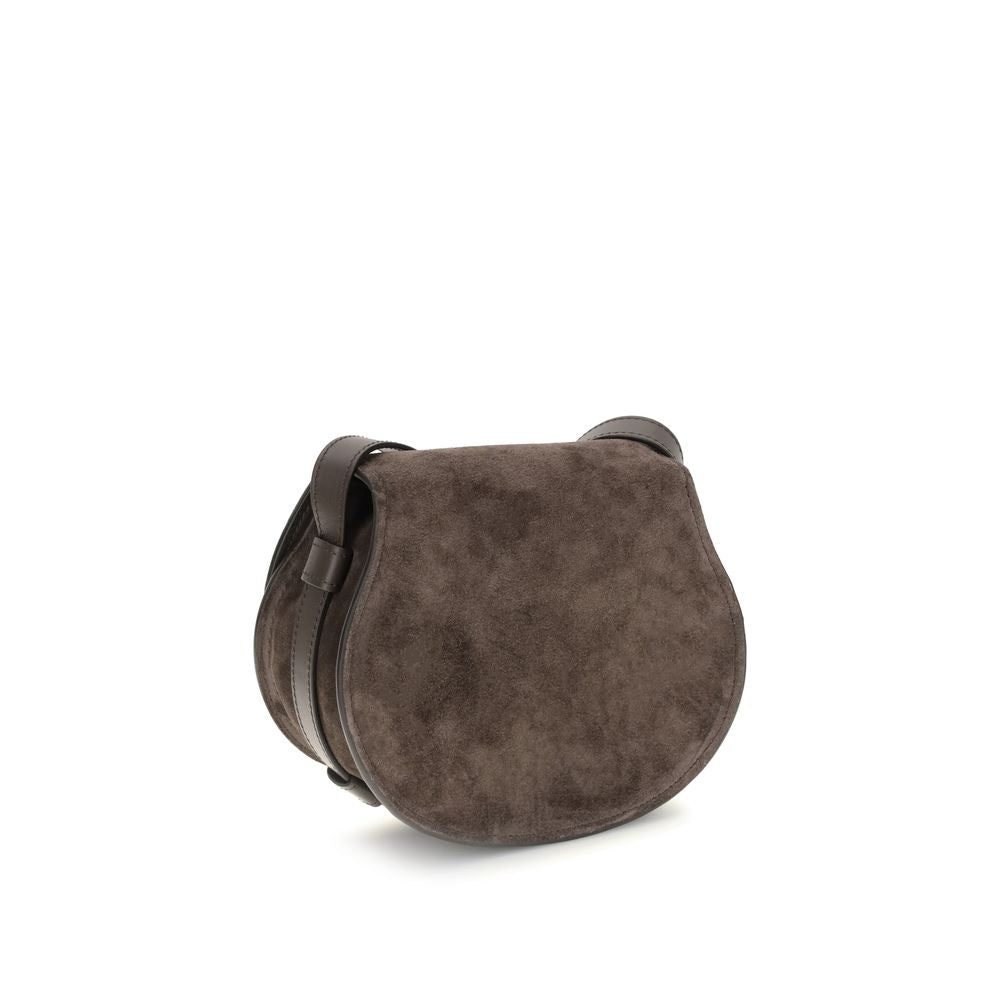 Brown Calf Leather Bos Taurus Shoulder BagChloé’s Marcie small Shoulder Bag stands out for its curved silhouette and defined top profile. The flap, embellished with leather tassels, is embellished with the iconic saddle stitching that characterizes the Ma