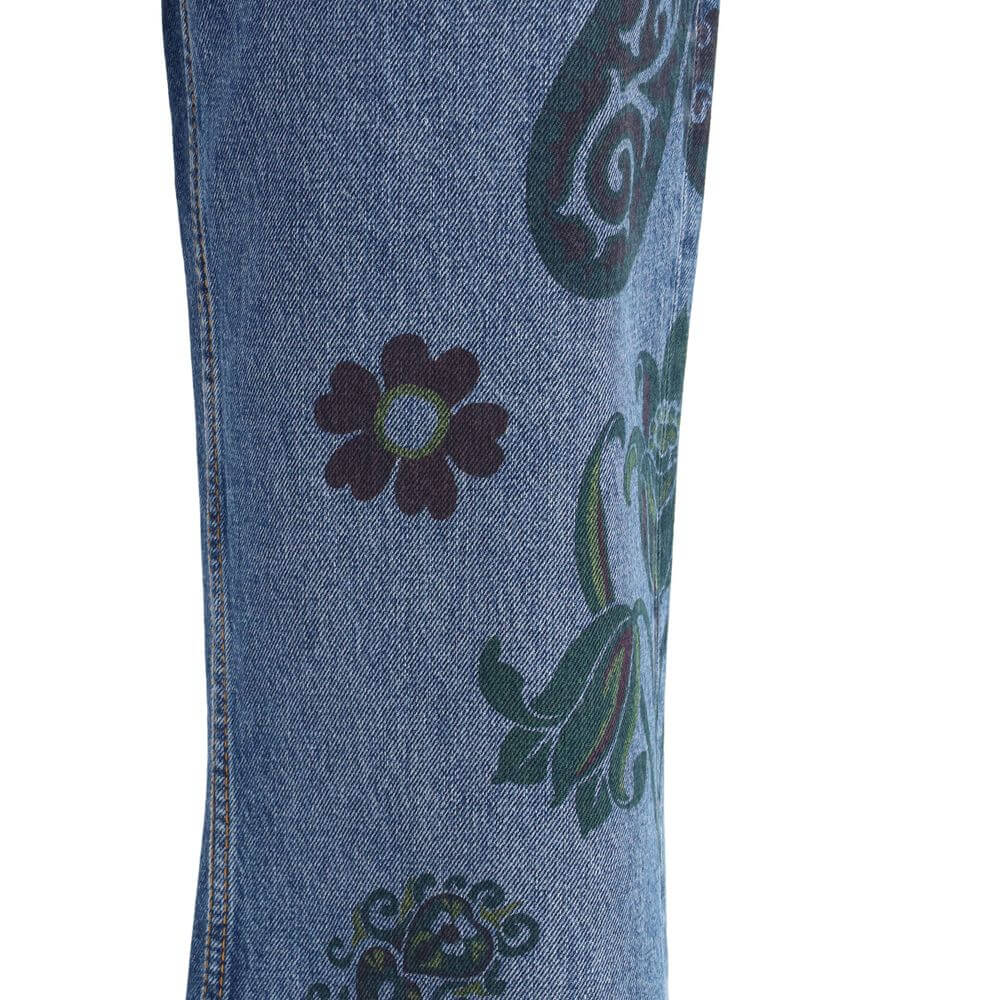 Blue Cotton Flared JeansEtro’s flower and bee print flare Jeans are a feminine, natural-spirited garment made from cotton denim. They feature a fitted line at the hips that opens into a flared bottom, enhanced by a print inspired by the natural world, wit