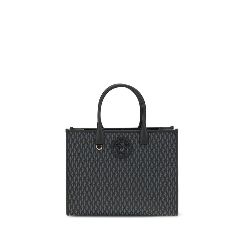 Black Cotton HandbagThe La Medusa Tote Bag by Versace is an iconic accessory with a strong character. Made with an Allover V pattern, it is embellished with the unmistakable La Medusa accessory on the front. Equipped with double handles for versatile port