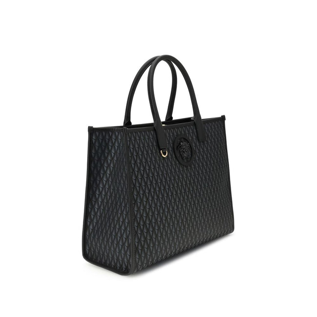 Black Cotton HandbagThe La Medusa Tote Bag by Versace is an iconic accessory with a strong character. Made with an Allover V pattern, it is embellished with the unmistakable La Medusa accessory on the front. Equipped with double handles for versatile port