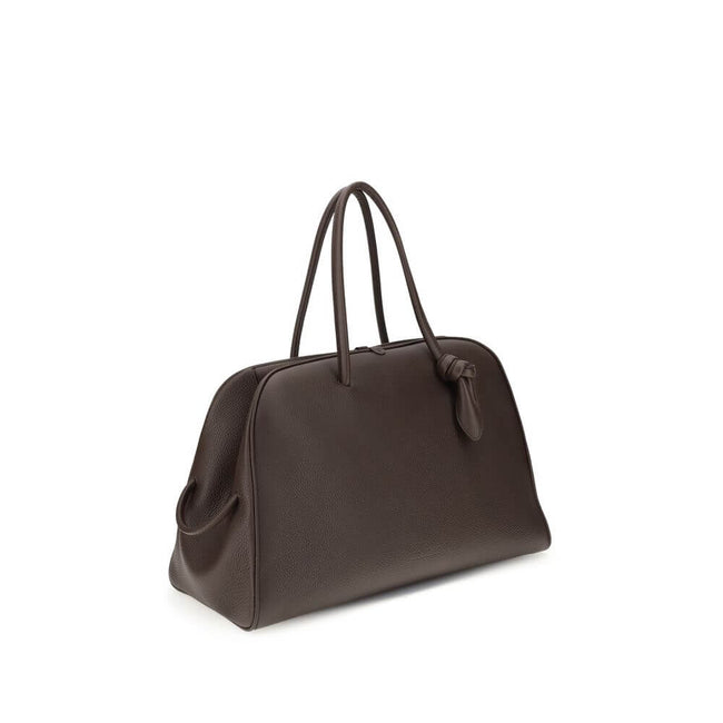 Brown Calf Leather Bos Taurus HandbagThe Le Grand Tourisme Travel Bag by Jacquemus reinterprets the classic bowling bag in a modern and sophisticated key. Made of grained leather, it features a structured and functional design with a two-way zipper closur