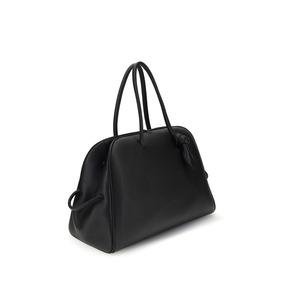 Black Calf Leather Bos Taurus HandbagThe Le Grand Tourisme Travel Bag by Jacquemus reinterprets the classic bowling bag in a modern and sophisticated key. Made of grained leather, it features a structured and functional design with a two-way zipper closur