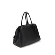 Black Calf Leather Bos Taurus HandbagThe Le Grand Tourisme Travel Bag by Jacquemus reinterprets the classic bowling bag in a modern and sophisticated key. Made of grained leather, it features a structured and functional design with a two-way zipper closur